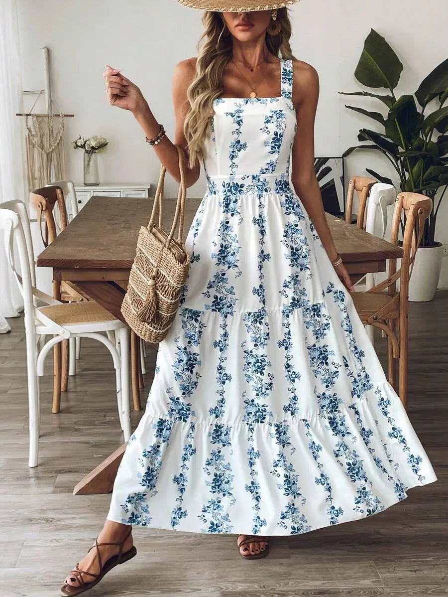 Woman wearing a white floral dress in a home setting